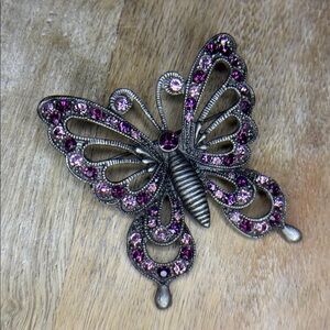 Large, pewter, silver, pink and purple rhinestone embedded butterfly brooch